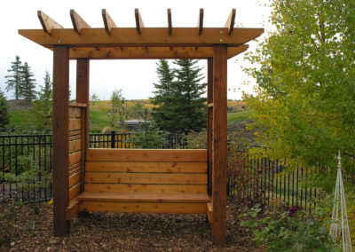 wooden arbor with bench